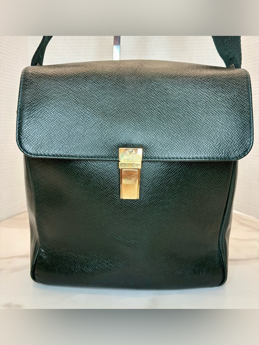 Louis Vuitton Yaranga bag in green Taiga leather. COA included